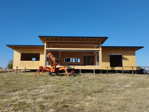 travauxmaisonossature-boisaudibertcharpentesconstructionbardageterrasse.webp